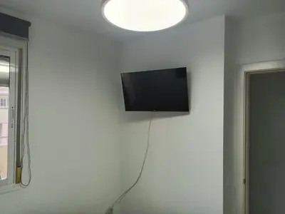 Una televisión o centro de entretenimiento en Ático Cassinello Roquetas