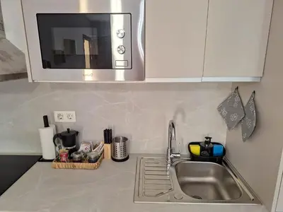Una cocina o zona de cocina en Amanecer Azul Bajo Vera Coast