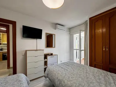 Cama o camas de una habitación en Apartment in Poblado near Playa Serena
