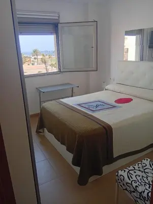 Cama o camas de una habitación en Apartamento Adra
