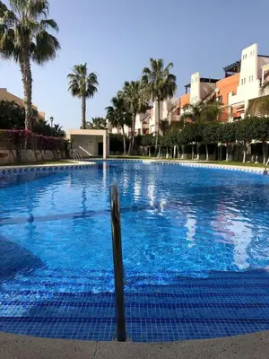 Piscina en o cerca de Bajo con Jardín junto al mar de vera playa
