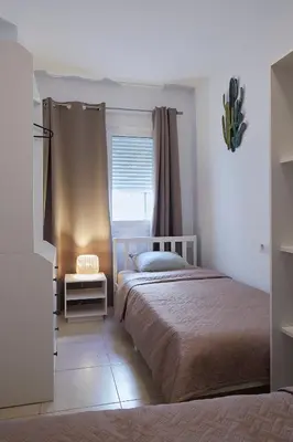 Cama o camas de una habitación en Casa los pececitos