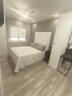 Cama o camas de una habitación en Vivienda premiun estación Nido 2