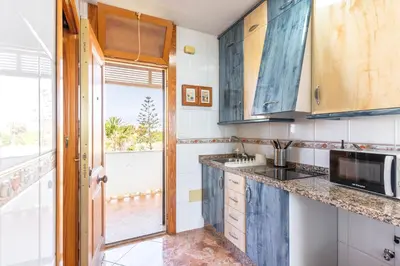 Una cocina o zona de cocina en Tropicana Playa R&R