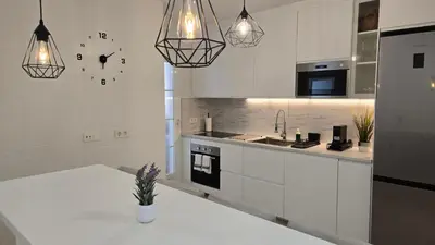 Una cocina o zona de cocina en Casa Puerta Roquetas