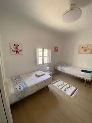 Cama o camas de una habitación en Casa rural la Antigua