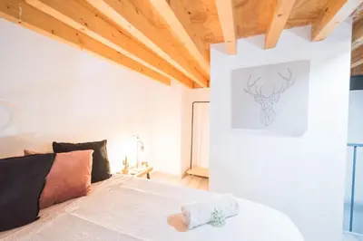 Cama o camas de una habitación en Apartamentos San Francisco con Terraza privada by Expoholidays