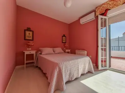 Cama o camas de una habitación en TrendyHomes Villa Los Aros