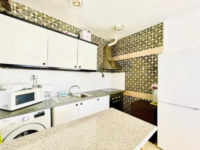 Una cocina o zona de cocina en Mountain-View Apartment by Sea