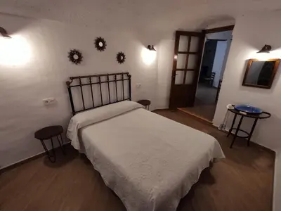Cama o camas de una habitación en Casa-cueva 'MI ABUELA L O L A'