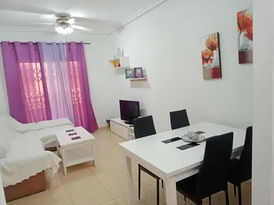 Cama o camas de una habitación en Apartamento en roquetas de mar