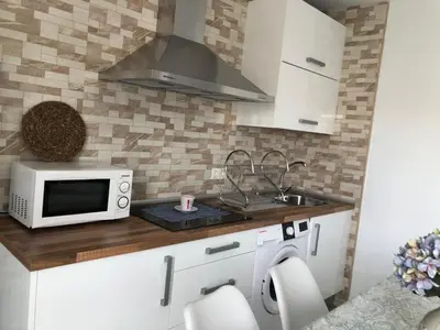 Una cocina o zona de cocina en El Rincón de Agua Amarga lll