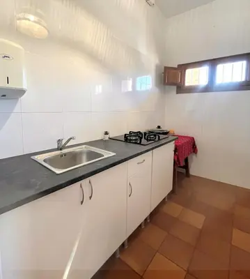Una cocina o zona de cocina en Camping Almocita-Alpujarra