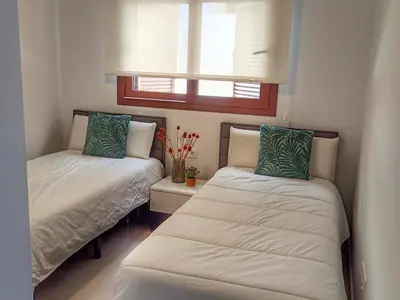 Cama o camas de una habitación en Apartamento moderno con piscina, a 500m de la playa, San Juan de los Terreros - ES-376-41