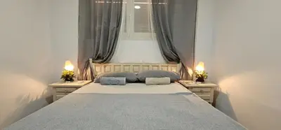 Cama o camas de una habitación en Seaside cozy suite with beautiful views