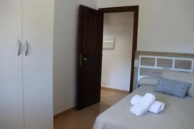 Cama o camas de una habitación en Uva Moscatel