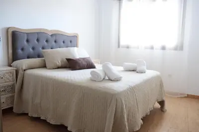 Cama o camas de una habitación en Uva Moscatel