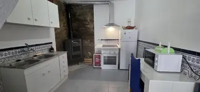 Una cocina o zona de cocina en Vivienda Turística de Alojamiento Rural - Labrucena