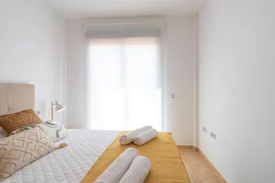 Cama o camas de una habitación en Amplia terraza, hermosa vista al mar, piscina - By Aloha Palma