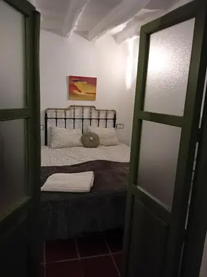 Cama o camas de una habitación en El Paraje de la Platera