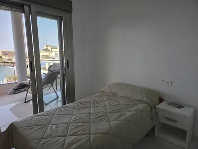 Cama o camas de una habitación en Balcón con impresionantes vistas a Bahia Hornillo