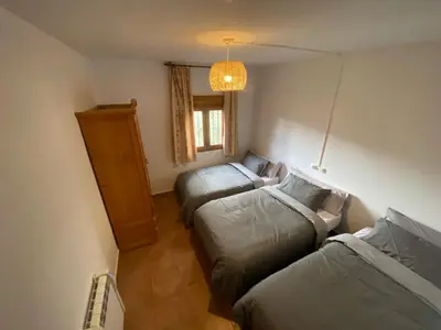Cama o camas de una habitación en Las olivas