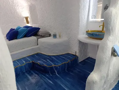 Cama o camas de una habitación en Cueva Doña Bona