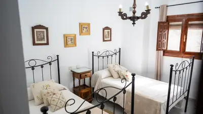 Cama o camas de una habitación en Casa rural el cerezo