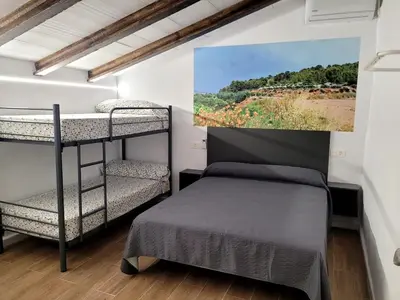 Cama o camas de una habitación en Casa Rural Motos