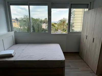 Cama o camas de una habitación en Studio 200 m from the sea