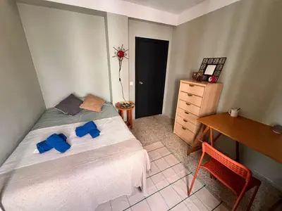 Cama o camas de una habitación en La Casa del Musico 3
