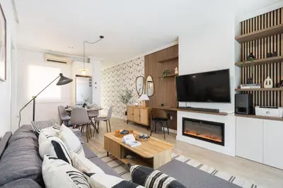 Una televisión o centro de entretenimiento en Apartamento en Reyes Católicos