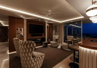 Una televisión o centro de entretenimiento en Beachfront apartamento in san josé