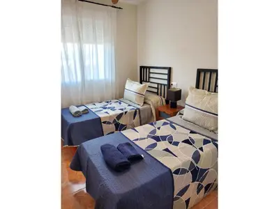 Cama o camas de una habitación en Seaside apartment in Vera with terrace