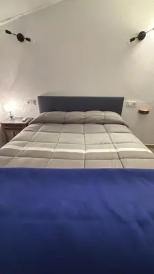Cama o camas de una habitación en Rufina casa rural con bañera hidromasaje