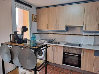 Una cocina o zona de cocina en apartamento en urbanización nudista