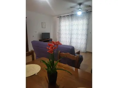 Una televisión o centro de entretenimiento en Apartment in Almeria with shared pool