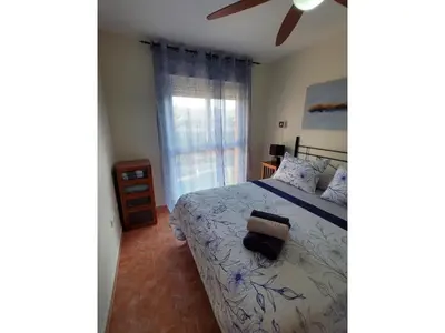 Cama o camas de una habitación en Cozy Apartment in Vera, Just Steps from the Beach