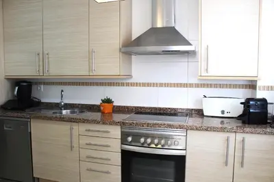 Una cocina o zona de cocina en Junto al Mar
