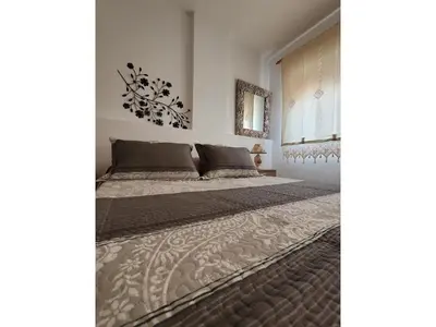 Cama o camas de una habitación en cozy vacation apartment in Vera