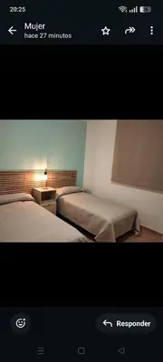 Cama o camas de una habitación en La estrella del desierto