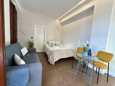 Cama o camas de una habitación en Lorca centro WiFi Experiencia única