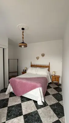 Cama o camas de una habitación en Habitaciones Lemon