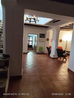 Zona de estar de Gustavo's Old House