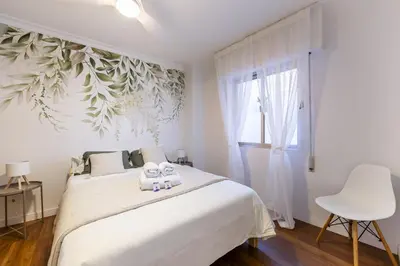 Cama o camas de una habitación en AlmeriaSuite Alcazaba Views