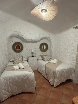 Cama o camas de una habitación en Bike Cueva - Desierto