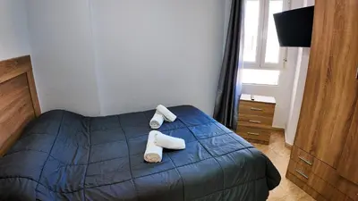 Cama o camas de una habitación en Apartalux Star Magic I