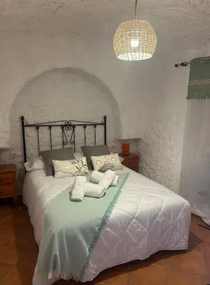 Cama o camas de una habitación en Bike Cueva - Badlands