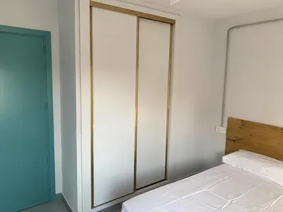 Cama o camas de una habitación en Apartamento en Zona de Playa