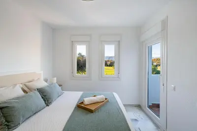 Cama o camas de una habitación en Apartamento isabel golf center